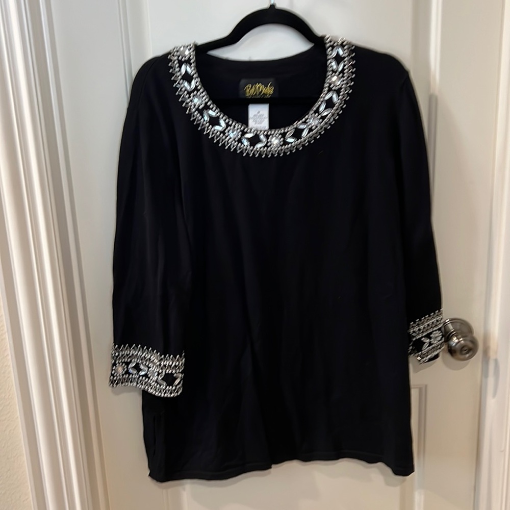 Long sleeved, embellished sweater designed by Bob Mackie